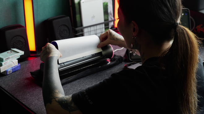 Tattoo session still with shallow focus