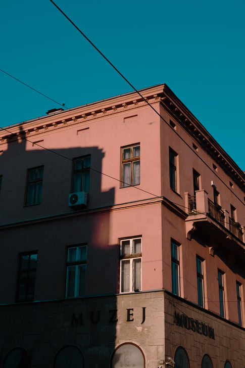 Vertical street image with deep shadows